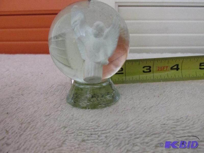 lot 23 image: Glass Spere with Angel inside.