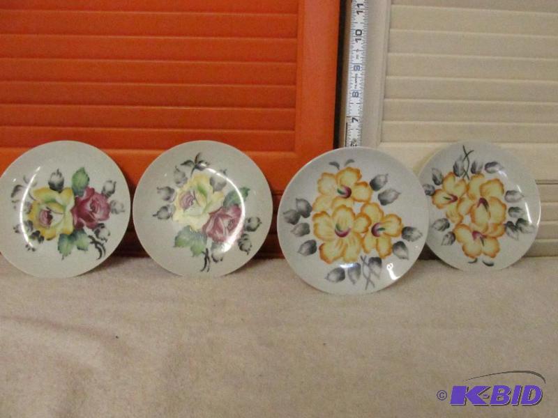 lot 88 image: A Set of Four Collector Plates.