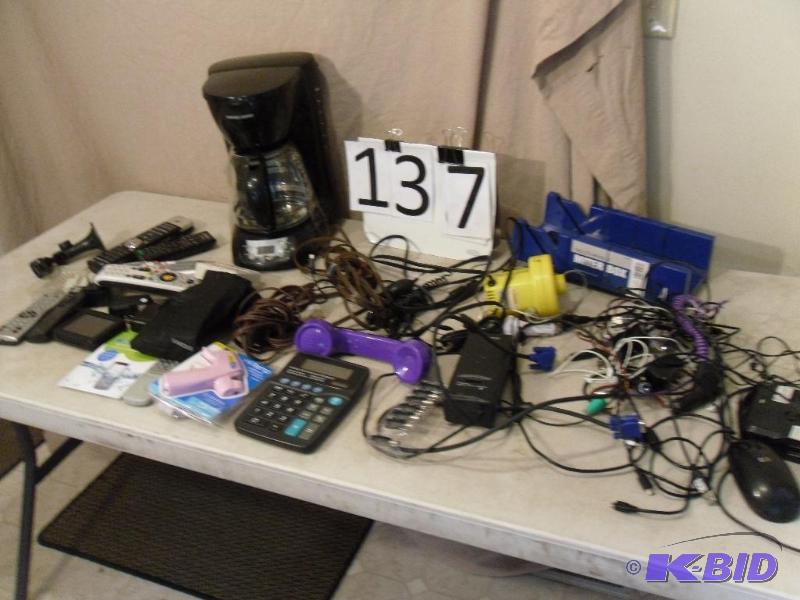 lot 137 image: GPS (), Calculator, Travel Surge Protector, ...