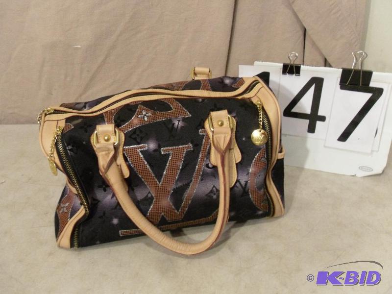 lot 147 image: Purse  Bag Marked Louis Vuitton. Normal wear...