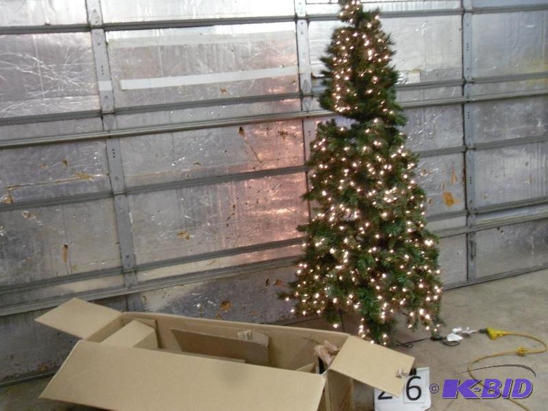 lot 26 image: 7 Ft Prelit Slim Christmas Tree with Box and ...