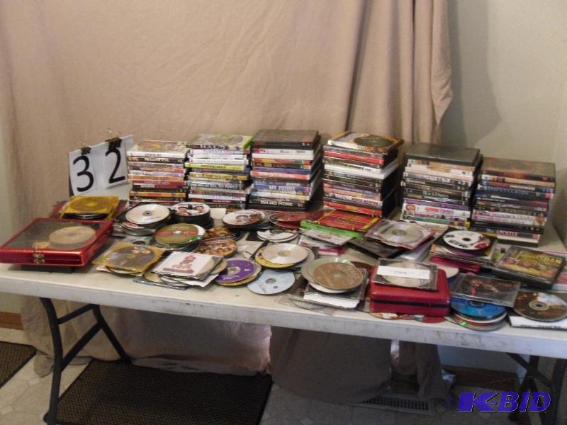 lot 33 image: LARGE Lot of Assorted DVDs and a few CDs an...
