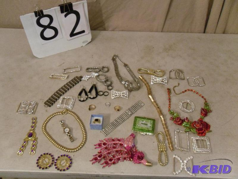 lot 82 image: Lot of Assorted Jewelry. Rings, Belt Buckles,...