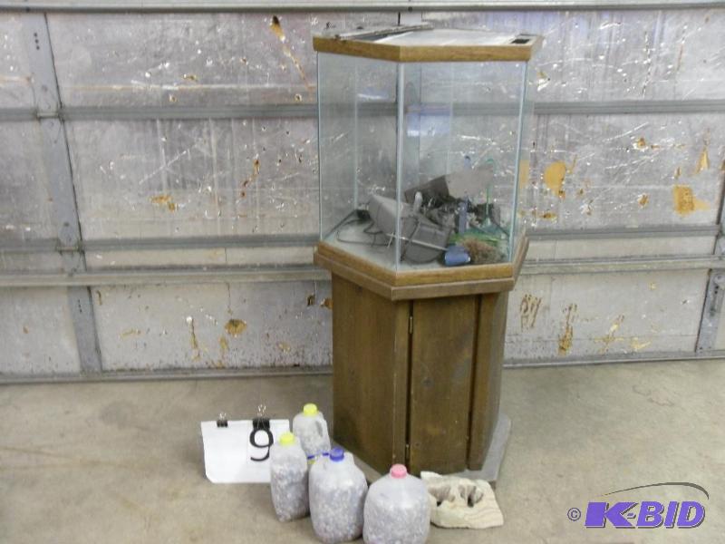 lot 9 image: Hexagon Fish Tank on Stand with Accessories. ...