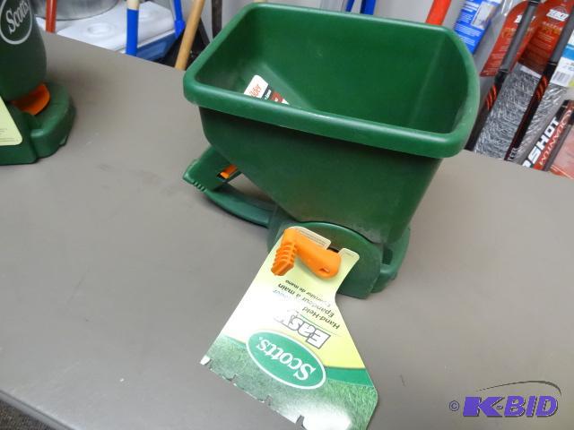 lot 128 image: NEW Scotts Easy Hand Held Spreader Model 7103...