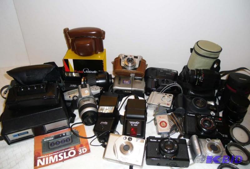 lot 20015 image: Lots of Cameras FILM AND DIGITAL Canon Minolta Pentax Rollei   Nimslo 3D,  35mm Addl Lenses