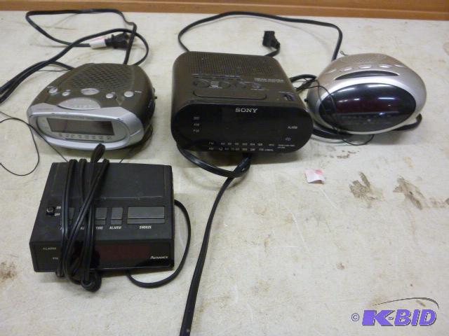 lot 21 image: 4 Alarm Clocks...