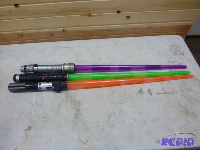 lot 216 image: 3 Star Wars Light Sabers ...