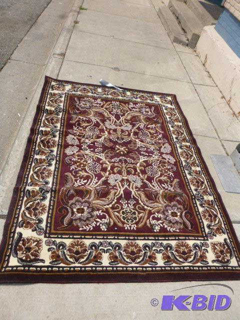 lot 37 image: Area Rug 62" X 82"...