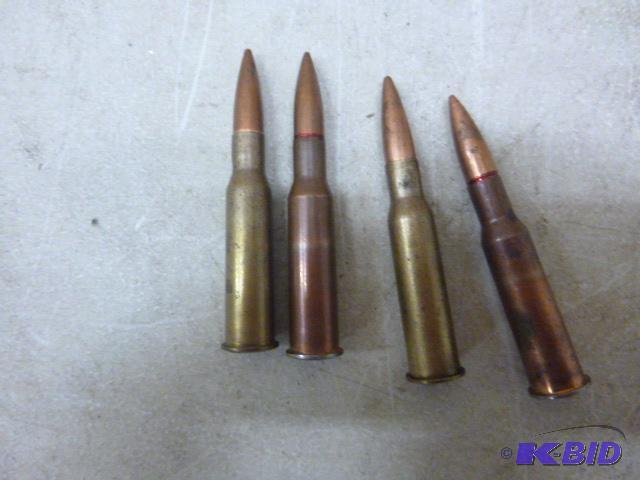 lot 88 image: 4 Rifle Shells Caliber unknown...
