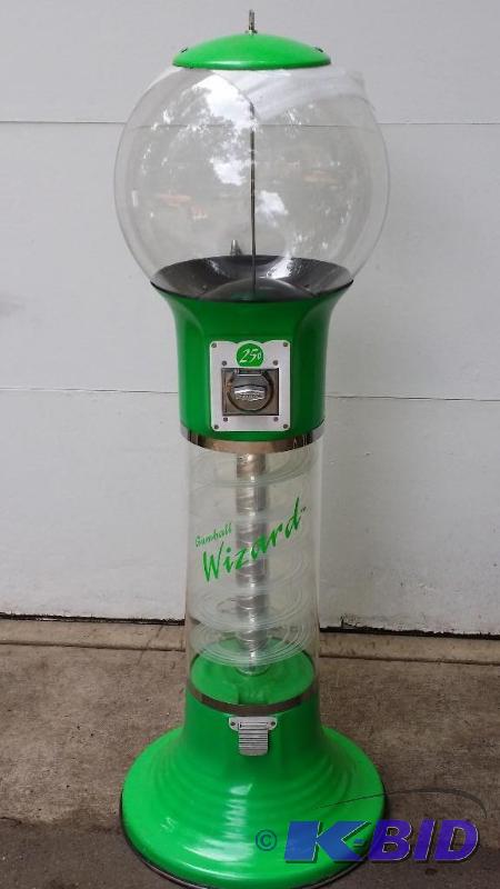 lot 2 image: Never used gumball Wizard, green in color, ta...