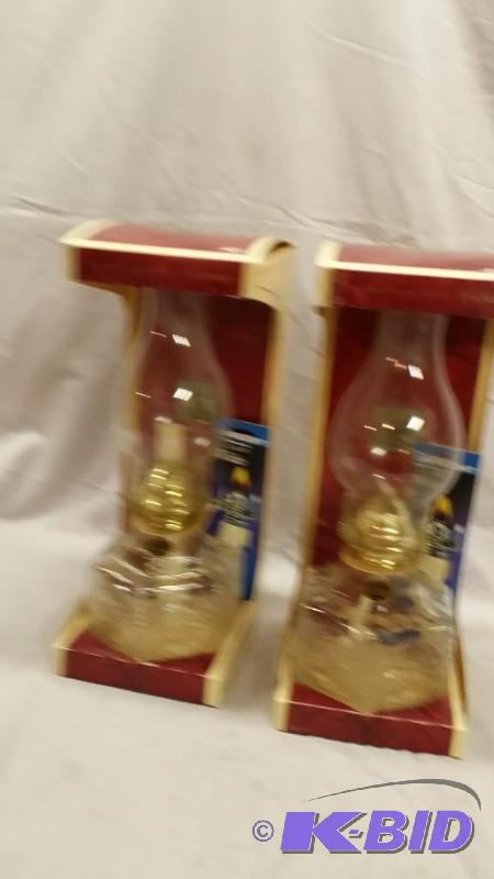 lot 4 image: Pair of matching oil lanterns, brand new come...