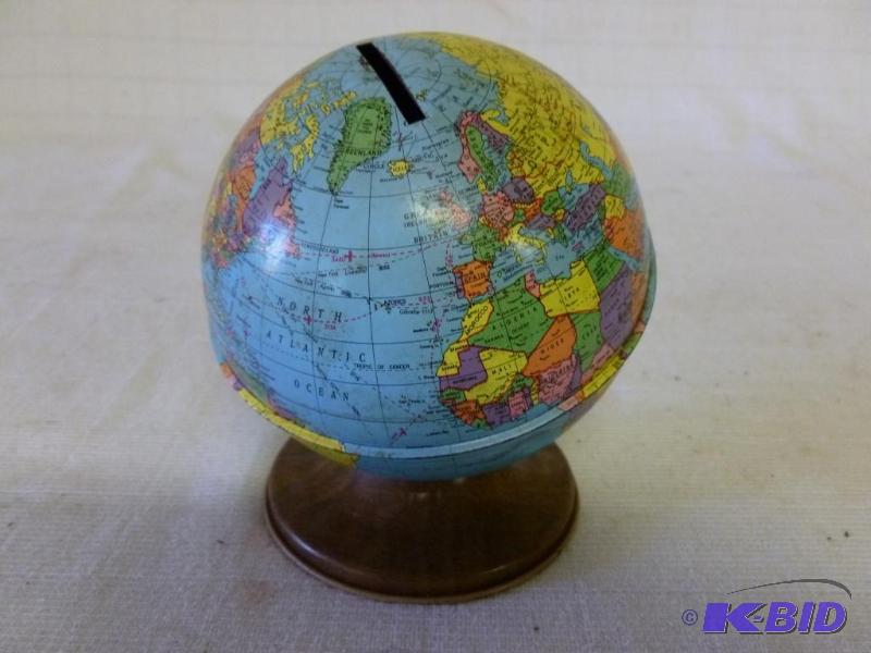 lot 110 image: Vintage Ohio Art metal globe coin bank that m...