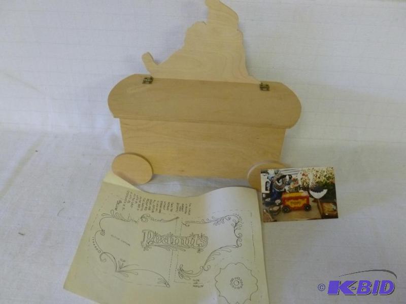 lot 177 image: Decorative wooden clown peanuts wagon that me...