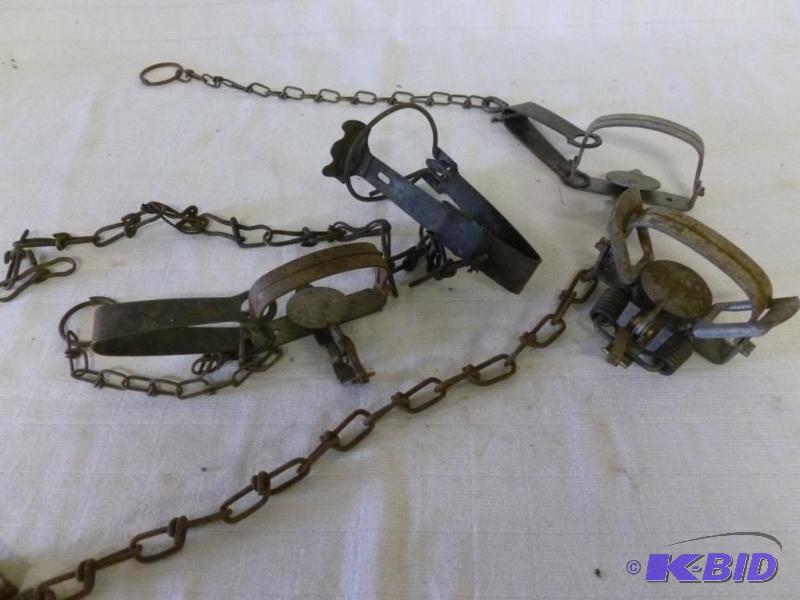 lot 180 image: This lot consists of three Duke leg traps and...