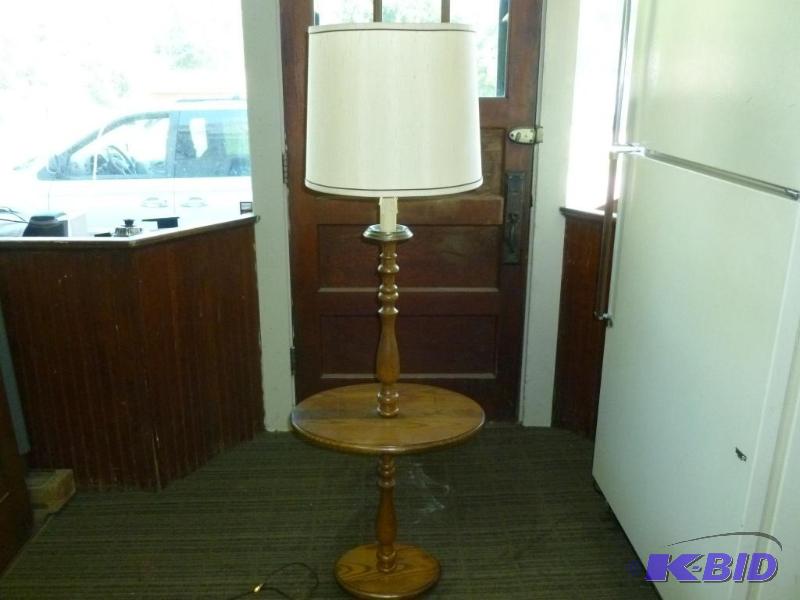 lot 41 image: Large oak bodied drop leaf floor lamp that me...