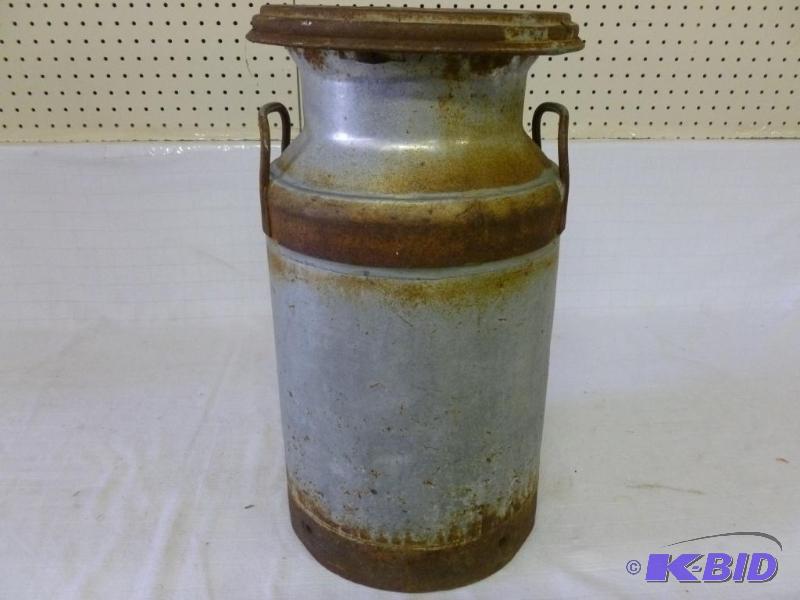 lot 47 image: Vintage metal cream can with lid that measure...