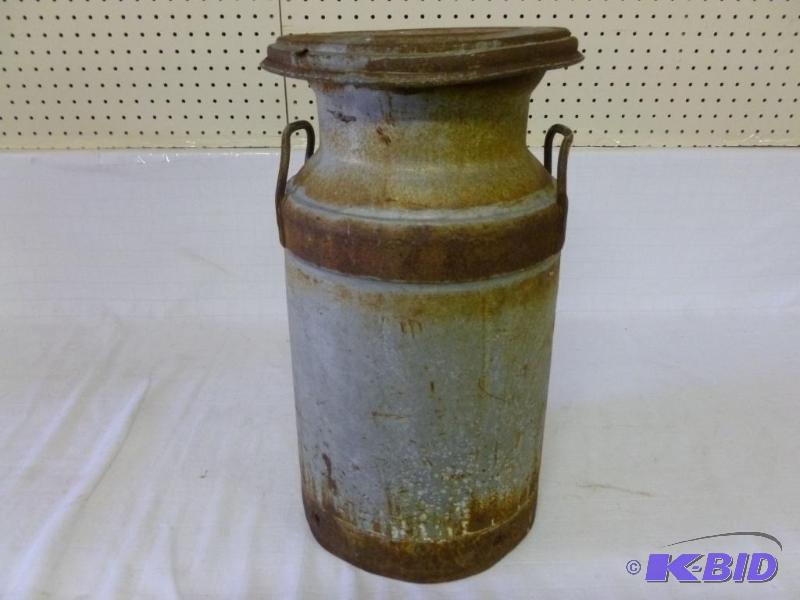 lot 71 image: Vintage metal cream can with lid that measure...