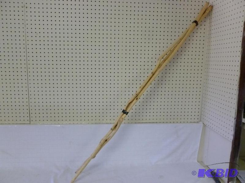 lot 80 image: Lot of three walking sticks that measure abou...
