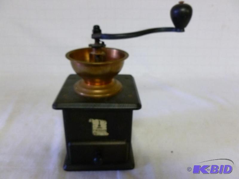 lot 92 image: Trosser&nbspcoffee grinder that measures 5&q...