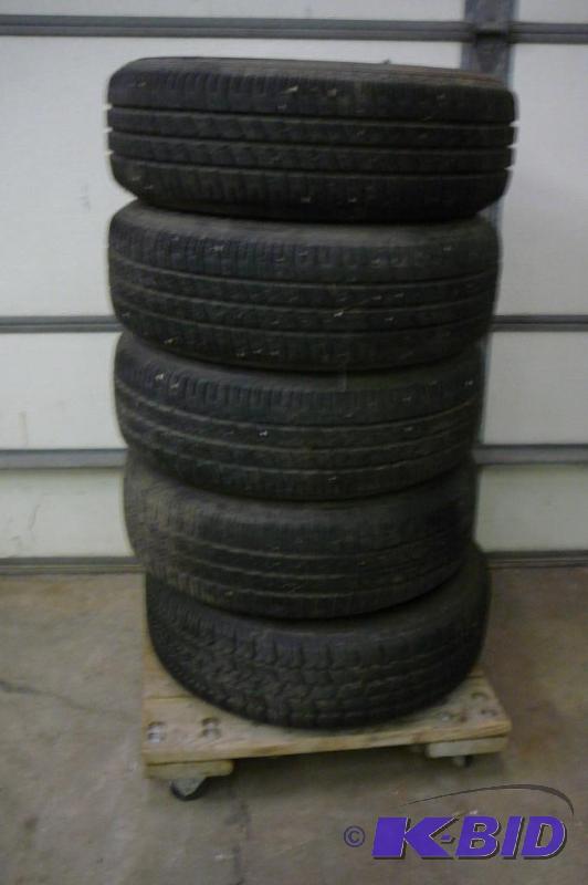 lot 1 image: 4- Tires & Wheels Bridgestone weater forc...