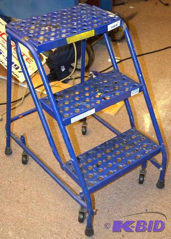 lot 15 image: Blue Rolling Step ladder 29" x 27"...