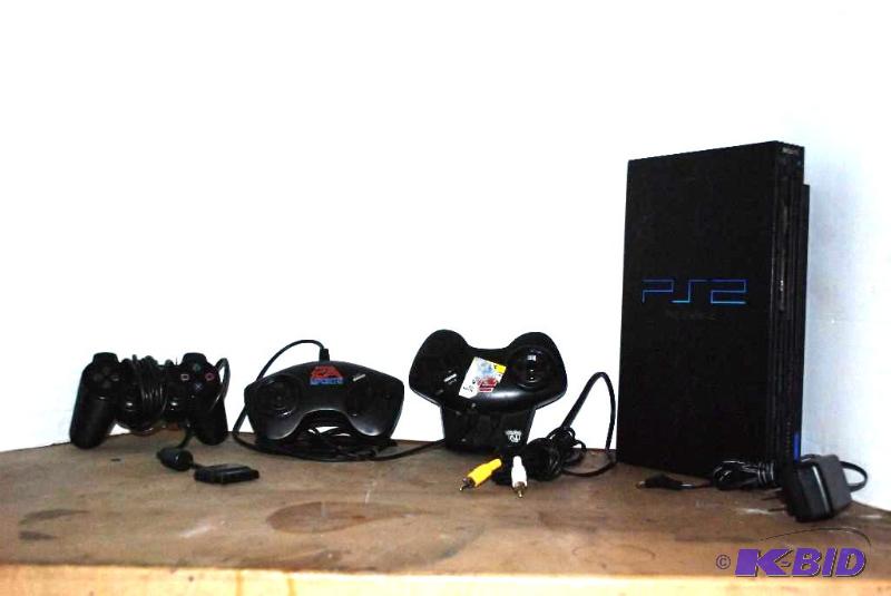lot 38 image: Sony PlayStation set- there may be games and ...