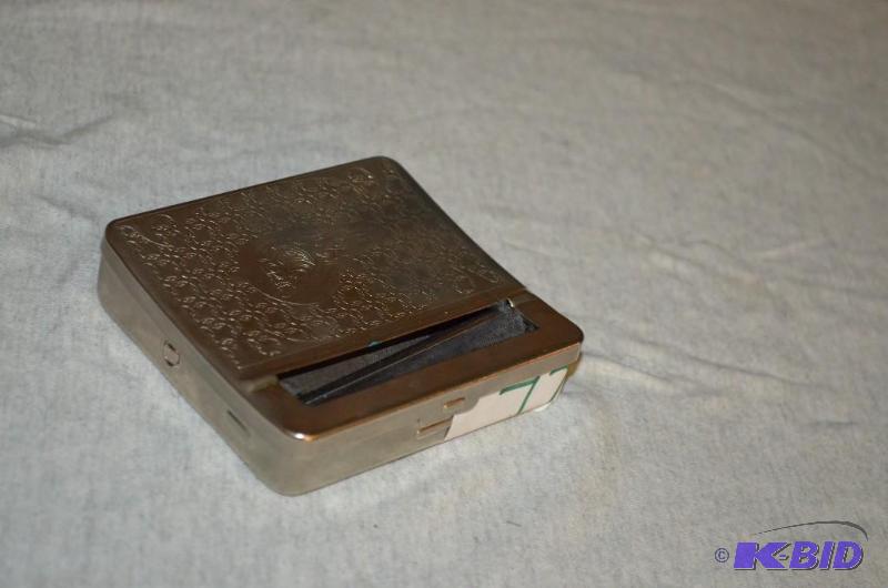 lot 77 image: Vintage Skulls Cigarette Roller...