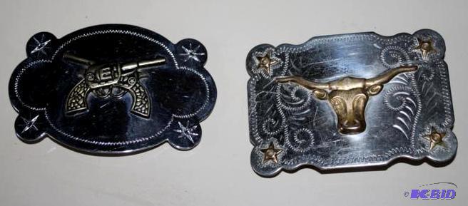 2 Western style belt buckles, one is nickel s...