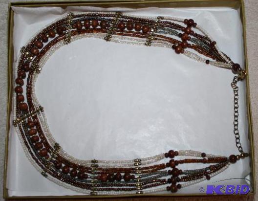 Multi strand glass bead necklace with brass s...
