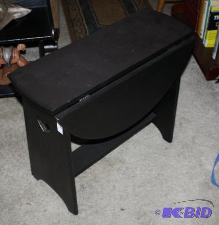 Black end table with foldable round leaves 22...