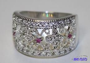 Elegant sterling silver wide band ring with a...