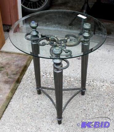 Ornate scroll iron side table with round beve...