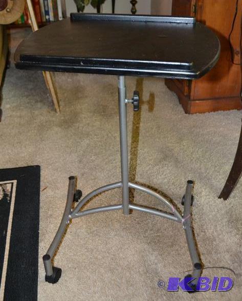 Small black laptop table on silver legs with ...