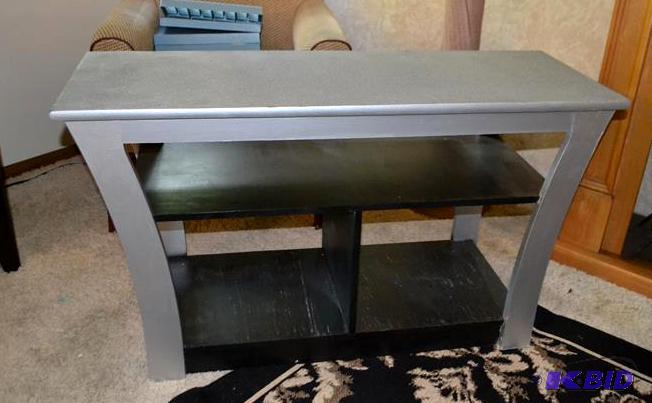 Perdue table with gray top and black sectione...