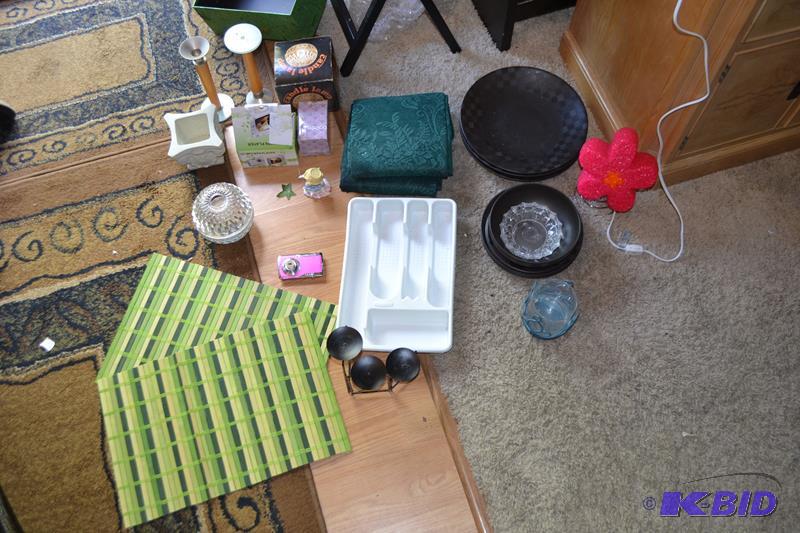 Green placemats  tall candle holders,  squ...