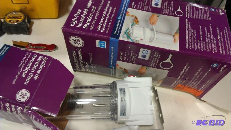 Two household water filtration systems. A lar...