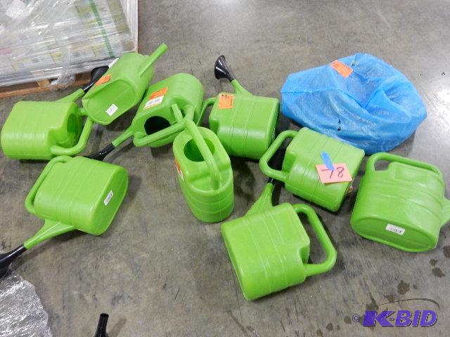 Large lot of water pitchers and a hose. Retur...
