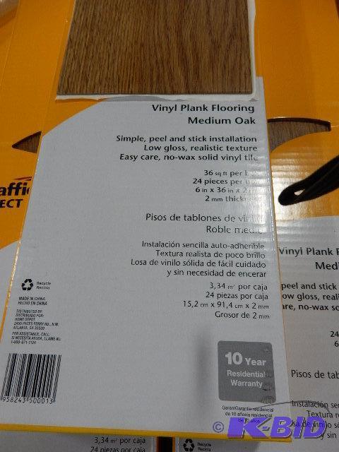 5 Boxes of Vinyl Floor Covering, Oak finish. ...