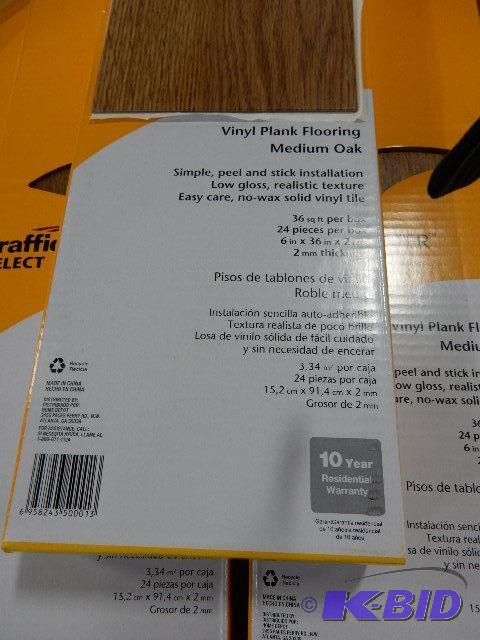 5 Boxes of Vinyl Floor Covering, Oak finish. ...