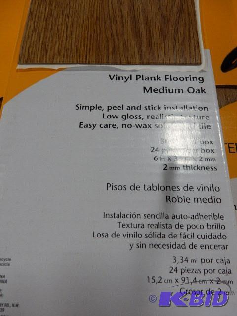 5 Boxes of Vinyl Floor Covering, Oak finish. ...