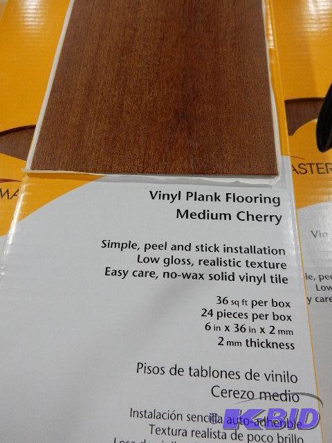 5 Boxes of Vinyl Floor Covering, Cherry finis...