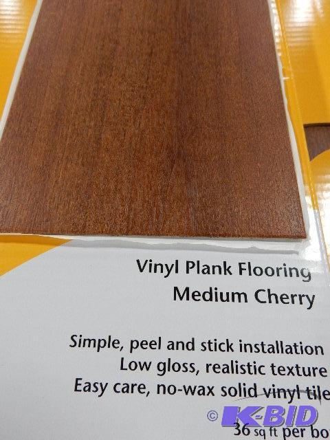 5 Boxes of Vinyl Floor Covering, Cherry finis...