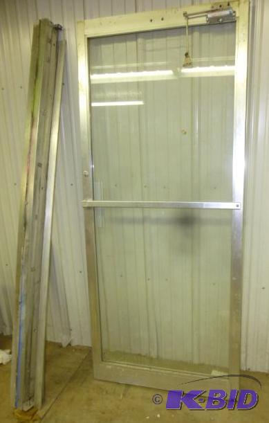 lot 12 image: Metal Glass Commercial Door With Metal Framew...