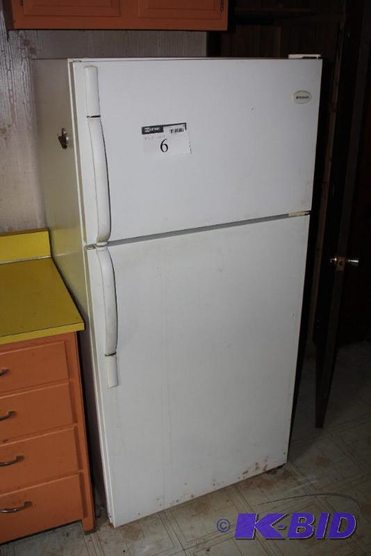 Frigidaire brand fridge with freezer and temp...