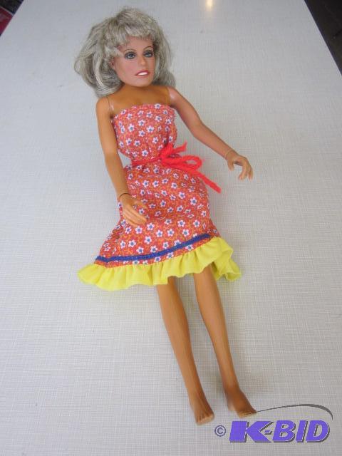 lot 128 image: Vintage 1970s Farrah Fawcett doll, with remo...