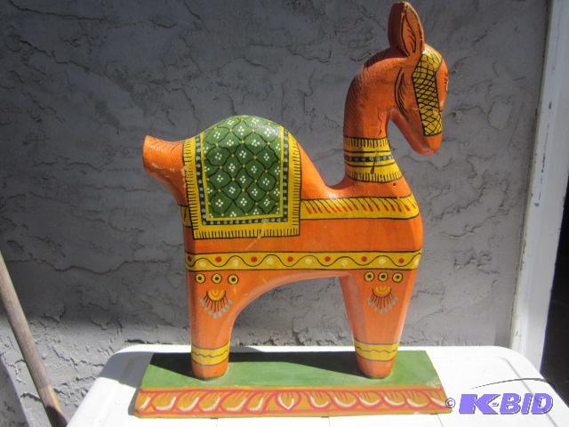 lot 129 image: 18 inch wooden painted Swedish horse....