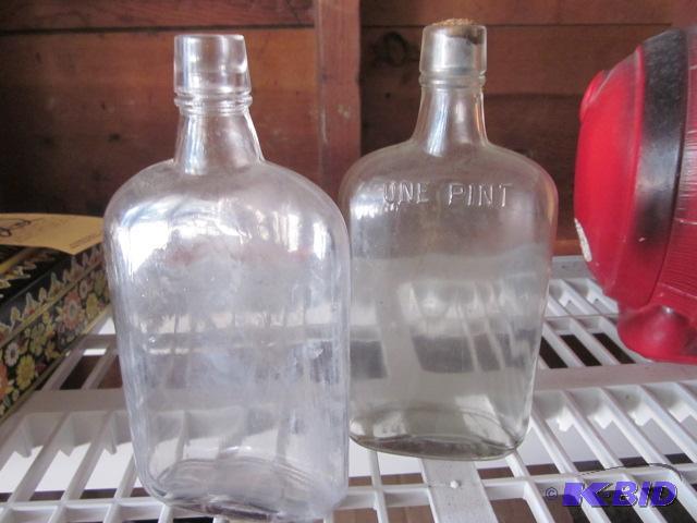 lot 23 image: Pair of old glass bottles, hand blown, (1) wi...