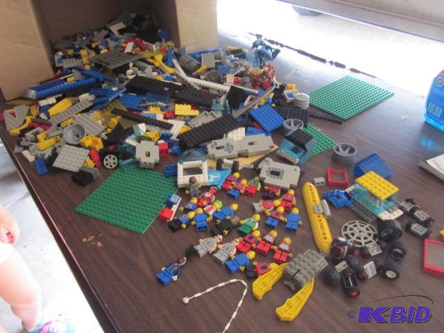 lot 26 image: Huge lot of vintage Legos, including wheels,...