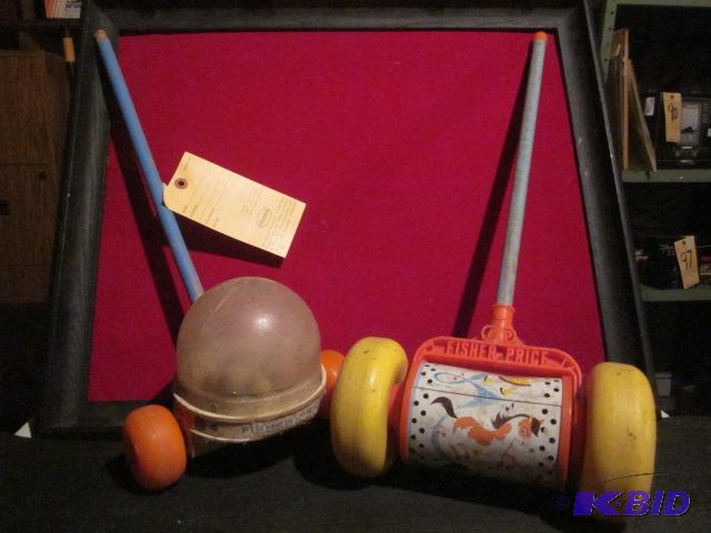 lot 83 image: Pair of vintage Fisher Price wood handle push...